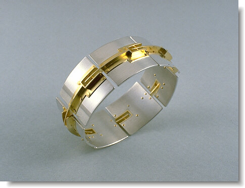 sterling silver and 18K gold bracelet with rivets