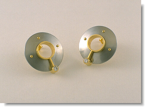 stainless steel, 18K and diamond earrings with rivets