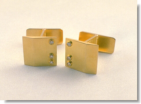 Roof cufflinks with diamonds