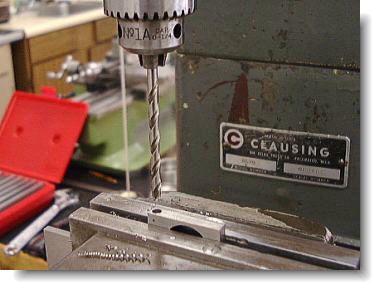 Drilling the holes for the gold tubes