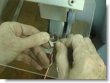 Grinding the shank on the bench grinder