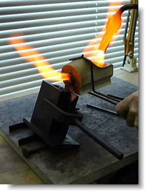 Melting the alloy components in a crucible