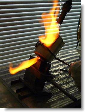 Pouring the melt into the ingot mold