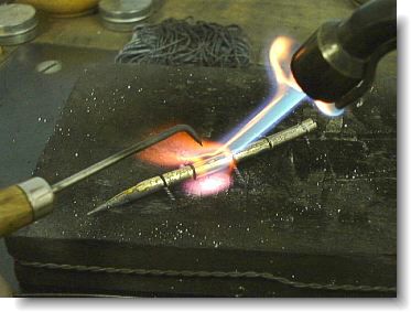 Soldering the gold tubing