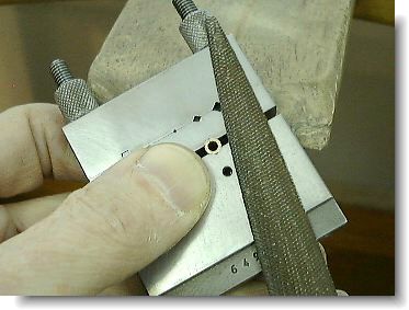 Filing the tubing square