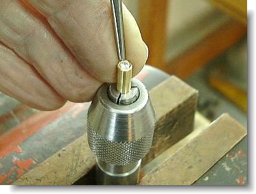 Hammering bezel with punch