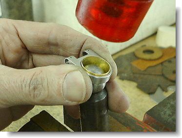 Hammering the bezel into the ring blank