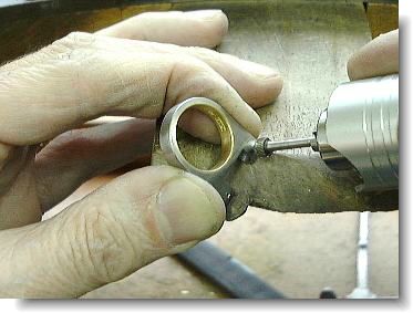 Counter sinking the rivet holes