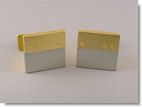 18K gold and stainless steel cufflinks