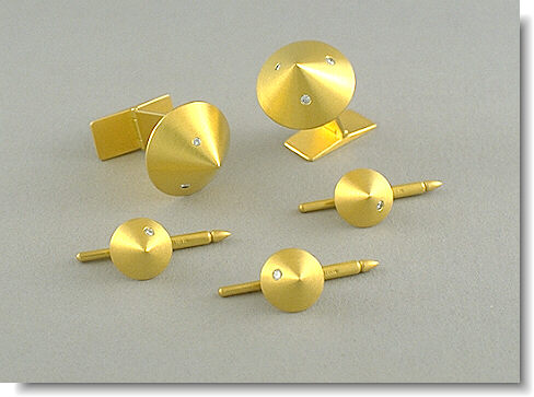 Cone cufflinks and studs with diamonds